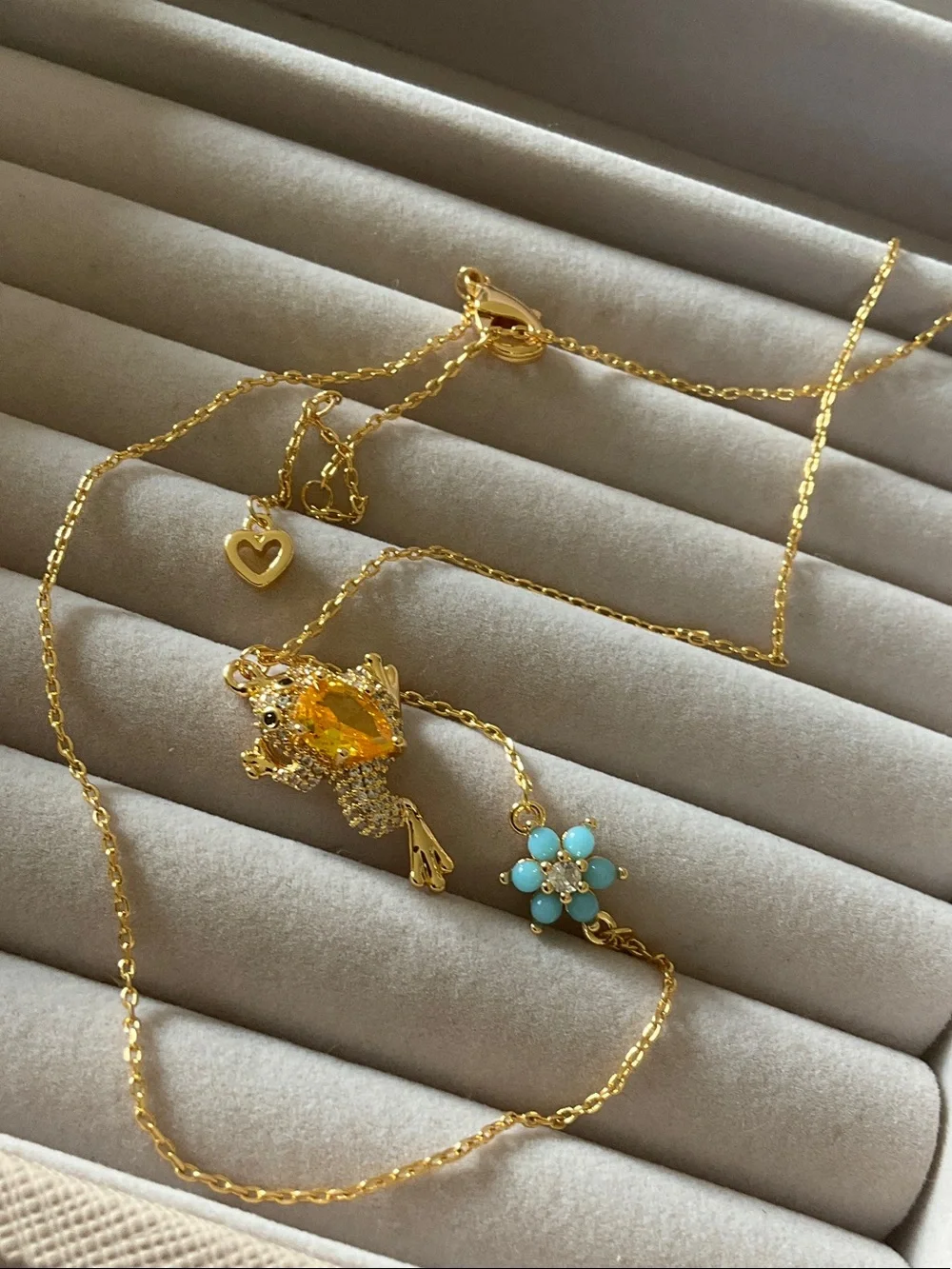 kate spade gold-tone frog pendant necklace with turquoise flower charm